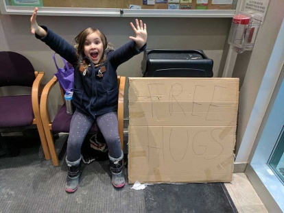 My daughter, Elizabeth, offering free hugs at the Pickering Islamic Centre on January 30, 2017.