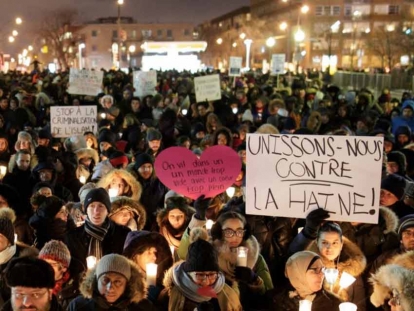 Mourners gather at a vigil in Quebec City in 2017 after the shooting at Centre Culturel Islamique de Québec